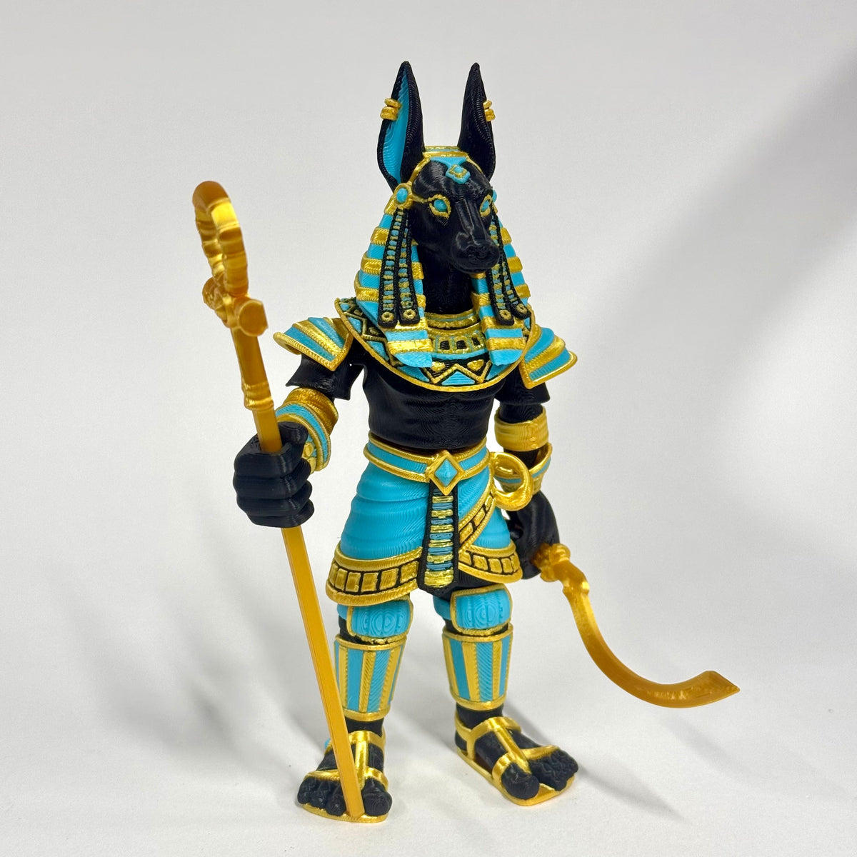 Anubis Egyptian Warrior 3D printed collectible shown in hand for scale – Iubi Design 3D