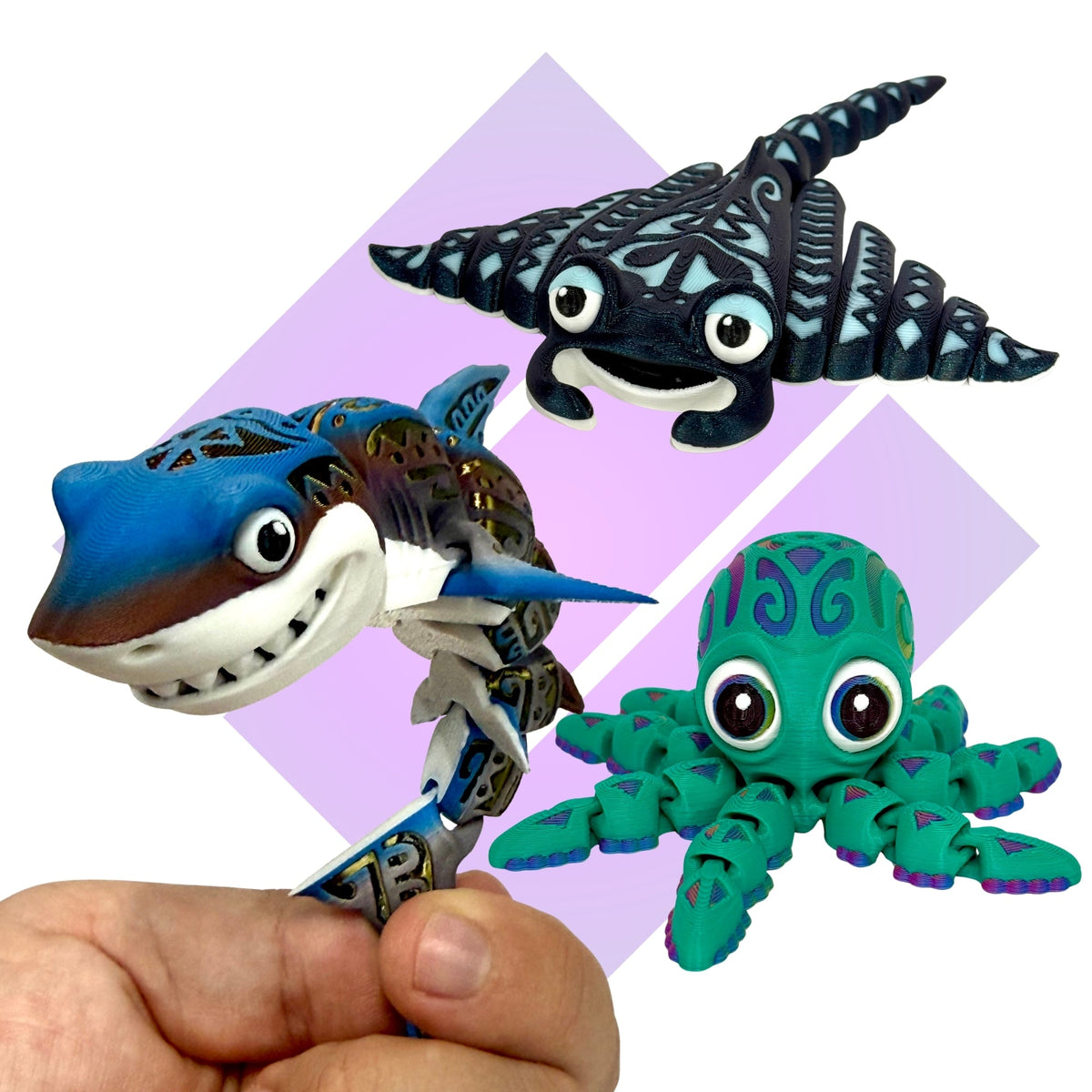 Tribal Creatures collection featuring articulated 3D printed manta ray, shark and octopus figures.