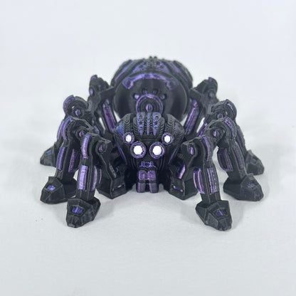 Cyber Spider shown from the front, with its articulated legs, bright eyes and purple detailing visible on the black body.