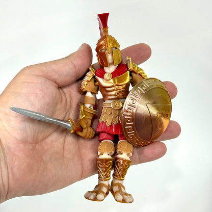 Spartan Champion 3D printed figure shown in hand for scale – Iubi Design 3D